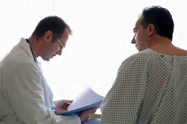 the doctor gives medicine for prostatitis to the patient